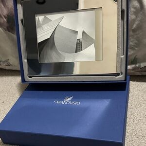 Swarovski tabletop picture frame with beautiful bedazzled edge.